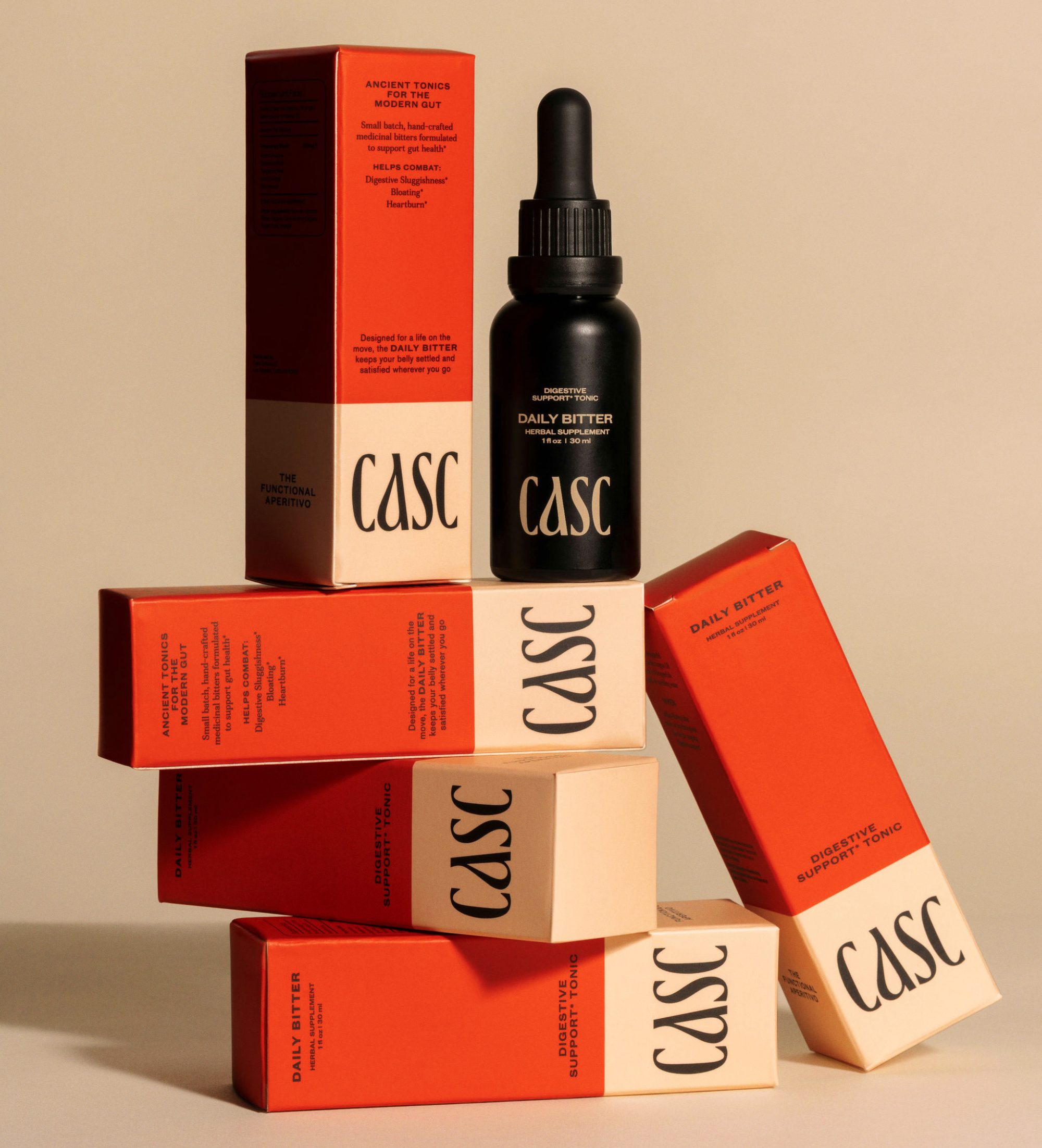 CASC Digestive Support Tonic, Daily Bitter Red Packaging Boxes with black dropper bottle, cream background