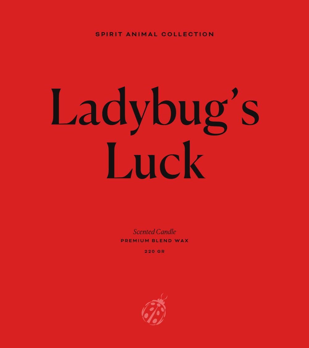 OJO Ladybug's Luck typography, Spirit Animal Collection, red background, black typography