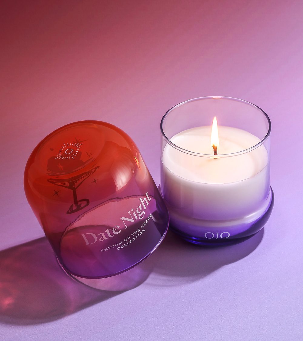 OJO Date Night candle collection with gradient colored glass jars and purple background