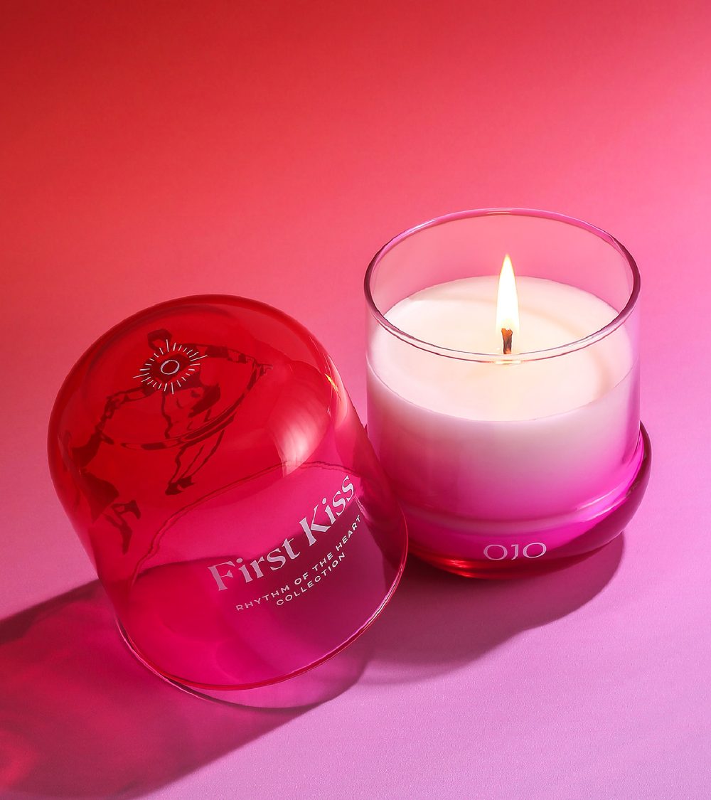 OJO First Kiss candle collection with gradient colored glass jar and pink background