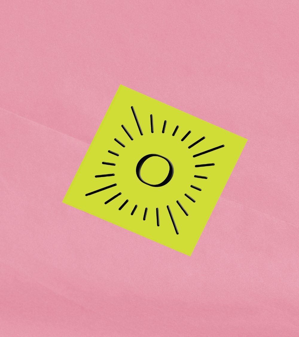 OJO emblem design by Parcour Studio, yellow sticker and pink background